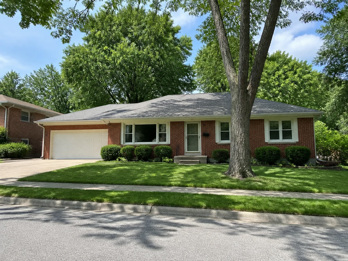 Brick ranch house on a tree-lined Omaha street